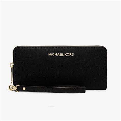 michael kors clutch schwarz weiß|michael kors wristlet outlet.